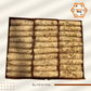 Overhead view of three rows of Jaggery Dry Fruit Papersweet rolls in the Pack of 30 collection, showing Kaju, Kaju Badam, and Kaju Badam Pista varieties side by side